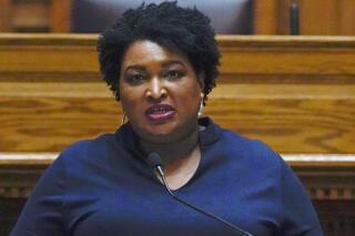 FILE - In this Monday, Dec. 14, 2020, file photo, Democrat Stacey Abrams speaks before members of Georgia's Electoral College cast their votes at the state Capitol, in Atlanta. Former Georgia gubernatorial candidate Abrams, a leading national voice on ballot access, will deliver the keynote address at an event commemorating the 100-year anniversary of the 1921 Tulsa Race Massacre, officials announced Wednesday, May 19, 2021. (AP Photo/John Bazemore, Pool, File)