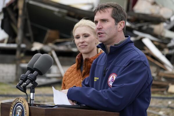 FILE - Kentucky Gov. Andy Beshear speaks after surveying storm damage from tornadoes and extreme weather in Dawson Springs, Ky., on Dec. 15, 2021. Some people unaffected by tornadoes that ravaged Kentucky in late 2021 were mistakenly sent payments from a relief fund funneling private donations into the region, the state treasurer's office said Wednesday, Feb. 1, 2023. Gov. Beshear set up the relief fund following deadly tornadoes that hit western Kentucky in late 2021. (AP Photo/Andrew Harnik, File)