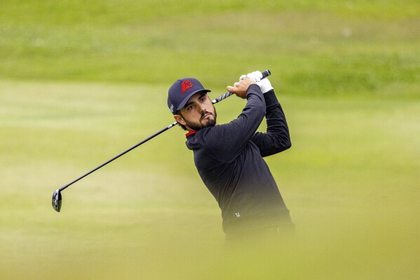 Abraham Ancer hits a shot on the third hole during the final round of LIV Golf Hong Kong at the Hong Kong Golf Club in Hong Kong Sunday, March 10, 2024. (Chris Trotman/LIV Golf via AP)