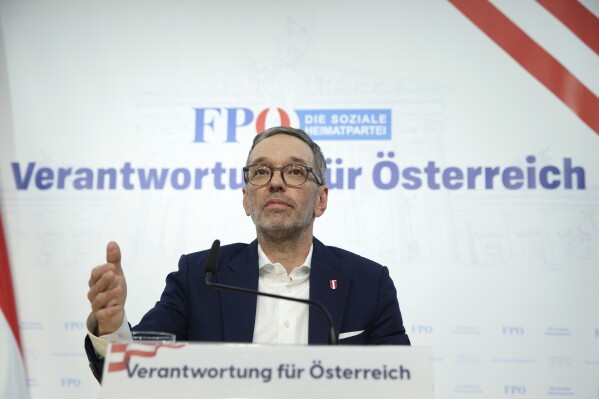 The leader of Austria's Freedom Party, Herbert Kickl, addresses a news conference, in Vienna, Austria, Tuesday, Jan 7, 2025. (AP Photo/Heinz-Peter Bader)
