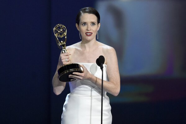 
              Claire Foy accepts the award for outstanding lead actress in a drama series for "The Crown" at the 70th Primetime Emmy Awards on Monday, Sept. 17, 2018, at the Microsoft Theater in Los Angeles. (Photo by Chris Pizzello/Invision/AP)
            