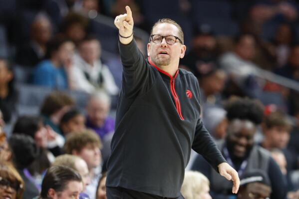 FILE - Toronto Raptors head coach Nick Nurse directs his team during the first half of an NBA basketball game against the Charlotte Hornets in Charlotte, N.C., Sunday, April 2, 2023. The Philadelphia 76ers hired Nurse on Monday, May 29, 2023, following his exit from the Toronto Raptors, a person with direct knowledge of the decision told The Associated Press. (AP Photo/Nell Redmond, File)