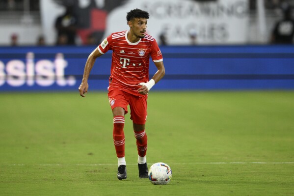 FILE - Bayern Munich forward Noussair Mazraoui in action during the first half of a friendly soccer match against D.C. United, Wednesday, July 20, 2022, in Washington. Bayern Munich has decided not to sanction Noussair Mazraoui after the Morocco right back expressed support for Palestine on social media. (AP Photo/Nick Wass, File)