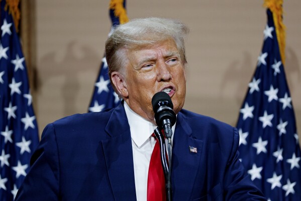 FILE - Former President Donald Trump speaks in Clinton Township, Mich., Wednesday, Sept. 27, 2023. Starting Monday, Oct. 2, Judge Arthur Engoron will preside over a non-jury trial in Manhattan to resolve remaining claims in New York Attorney General Letitia James’ lawsuit against former President Donald Trump, his company and top executives. (AP Photo/Mike Mulholland, File)