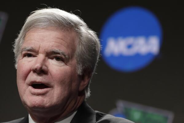 FILE - In this April 4, 2019, file photo, NCAA President Mark Emmert answers questions during a news conference at the Final Four college basketball tournament in Minneapolis. The NCAA Board of Governors voted Tuesday, April 27, 2021, to extend Emmert's contract by two years through 2025. Emmert’s contract was set to expire in 2023, but the board voted unanimously to extend his deal. (AP Photo/Matt York, File)