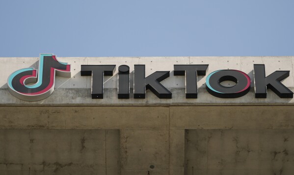 A TikTok sign is displayed on their building in Culver City, Calif., Monday, March 11, 2024. House Republicans are moving ahead with a bill that would require Chinese company ByteDance to sell TikTok or face a ban in the United States even as President Donald Trump is voicing opposition to the effort. (AP Photo/Damian Dovarganes)