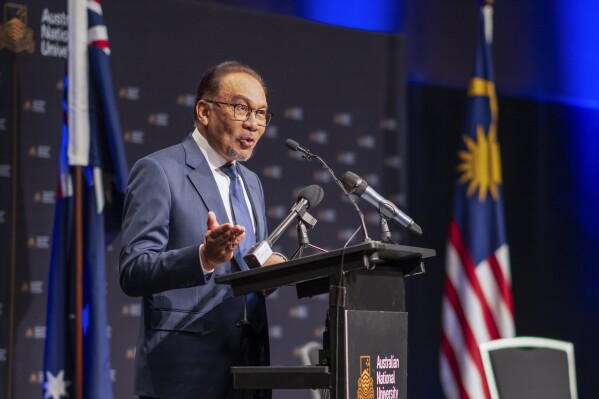 Malaysian Prime Minister Anwar Ibrahim delivers the 2024 Gareth Evans Oration at the Australian National University in Canberra, Australia, Thursday, March 7, 2024. (Jamie Kidston/The Australian National University via AP)