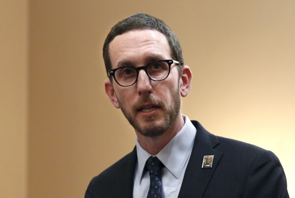 FILE - State Sen. Scott Wiener, D-San Francisco, speaks at a news conference in Sacramento, Calif., on Jan. 21, 2020. California lawmakers approved legislation Monday, Sept. 11, 2023, requiring major companies to disclose a sweeping range of greenhouse gas emissions. The bill, introduced by Wiener, would make companies making more than $1 billion annually report their direct and indirect emissions. (AP Photo/Rich Pedroncelli, File)