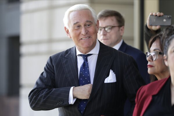 FILE - In this Nov. 15, 2019, file photo Roger Stone exits federal court in Washington. A federal prosecutor is prepared to tell Congress on Wednesday, June 24, 2020, that Stone, a close ally of President Donald Trump, was given special treatment ahead of his sentencing because of his relationship with the president. (AP Photo/Julio Cortez, File)