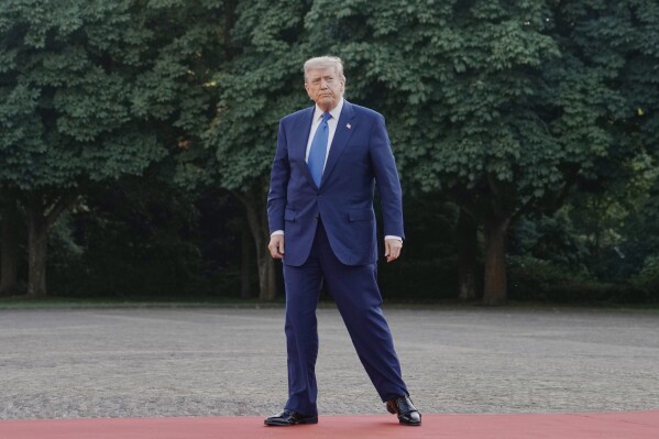 President Donald Trump arrives for a formal dinner at the Paleis Huis ten Bosch ahead of the NATO summit in The Hague, Netherlands, Tuesday, June 24, 2025. (AP Photo/Markus Schreiber)