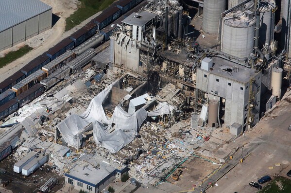 FILE - Part of the Didion Milling Plant in Cambria, Wis., lies in ruins following an explosion on June 1, 2017. A federal jury has convicted two Didion Milling senior employees of falsifying records and obstructing an investigation into the fatal corn dust explosion at the company's Cambria plant in 2017, Justice Department officials announced on Tuesday, Oct. 17, 2023. (John Hart/Wisconsin State Journal via AP, File)