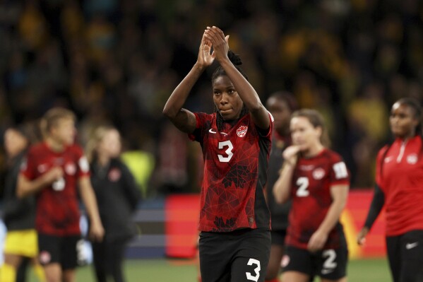 Canada's Kadeisha Buchanan applauds the fans at the end of the Women's World Cup Group B soccer match between Australia and Canada in Melbourne, Australia, Monday, July 31, 2023. Australia won 4-0. (AP Photo/Hamish Blair)