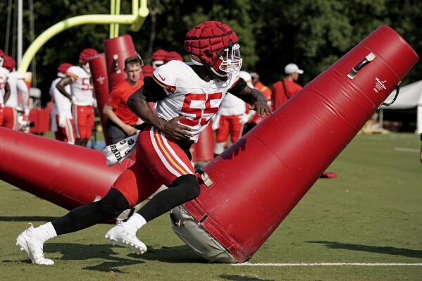 Kansas City Chiefs defensive end Frank Clark participates in a drill during NFL football training camp Monday, Aug. 1, 2022, in St. Joseph, Mo. (AP Photo/Charlie Riedel)