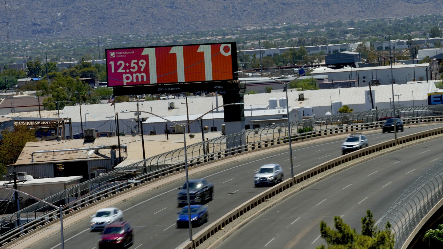 Phoenix sweltered from heat that will break record for US cities