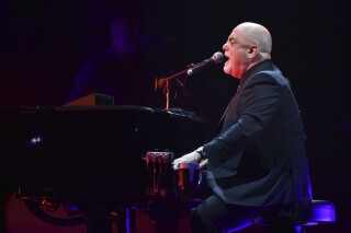 FILE - Musician Billy Joel performs during his 100th lifetime performance at Madison Square Garden on Wednesday, July 18, 2018, in New York. The performance will air on CBS and can be streamed on Paramount+ on Sunday, April 14. (Photo by Evan Agostini/Invision/AP, File)