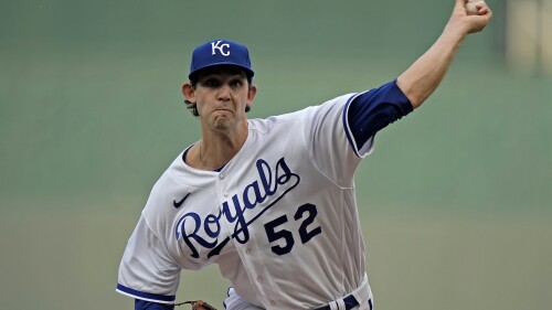 Kansas City Royals starting pitcher Daniel Lynch throws during the first inning of a baseball game against the Detroit Tigers Tuesday, July 18, 2023, in Kansas City, Mo. (AP Photo/Charlie Riedel)