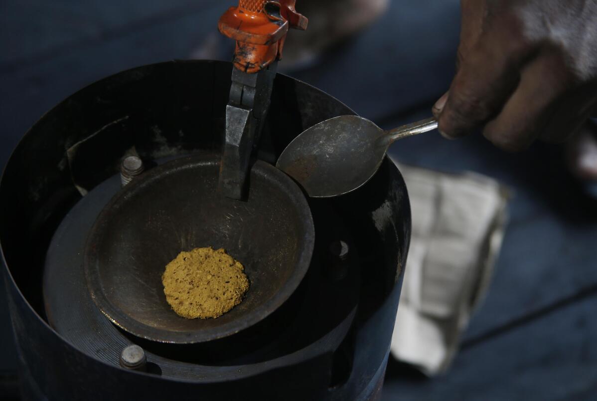 Big Brazilian gold refiner delisted amid Amazon mining probe | AP News
