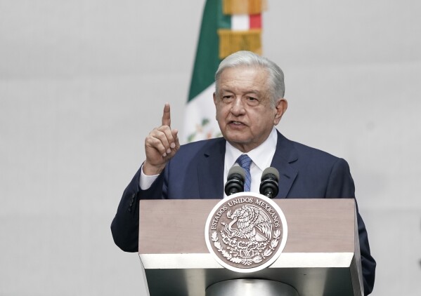 FILE - Mexico's President Andres Manuel Lopez Obrador speaks during a rally marking his fifth anniversary in office, at the Zocalo in Mexico City, July 1, 2023. Mexico’s president has vowed to continue campaigning against the opposition front-runner for the 2024 presidential elections, breaking a longstanding tradition of Mexican presidents keeping out of the race to succeed them. (AP Photo/Aurea Del Rosario, File)