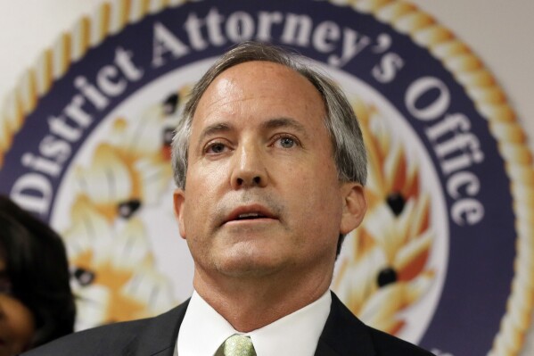 FILE - Texas Attorney General Ken Paxton speaks at a news conference in Dallas on June 22, 2017. The Texas attorney general who survived a historic impeachment trial last year made a Super Tuesday primary a bitter Republican-on-Republican brawl, targeting the House speaker and dozens of other lawmakers who had sought his ouster. (AP Photo/Tony Gutierrez, File)