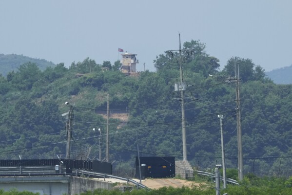 A North Korean military guard post is seen from Paju, South Korea, near the border with North Korea, Tuesday, June 18, 2024. South Korean soldiers fired warning shots to repel North Korean soldiers who temporarily crossed the rivals' land border Tuesday for the second time this month, South Korea's military said. (AP Photo/Ahn Young-joon)