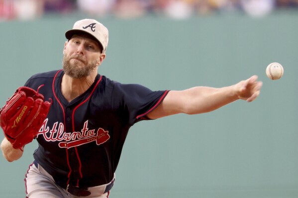Atlanta Braves pitcher Chris Sale throws during the first inning of a baseball game against the Boston Red Sox, Friday, May 16, 2025, in Boston. (AP Photo/Mark Stockwell)
