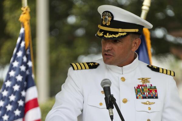 In this image provided by the U.S. Navy, Capt. Brian Drechsler, commanding officer, Naval Special Warfare Center (NSWCEN), speaks during a change of command ceremony at Naval Amphibious Base Coronado, on July 23, 2021. U.S. officials say Dreschler, who was reprimanded in connection with the death in 2022 of a Navy SEAL candidate, has been pulled out of his job about two months early.(Mass Communication Spc. 1st Class Anthony W. Walker/U.S. Navy via AP)