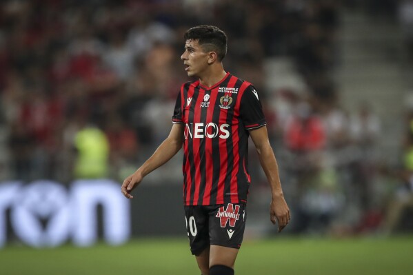 FILE - Nice's Youcef Atal looks across the field during the French League One soccer match between Nice and Marseille at the Allianz Riviera stadium in Nice, southern France, on Aug. 28, 2019. French authorities detained Nice defender Youcef Atal and ordered him to stand trial next month on charges of inciting hatred after he shared an antisemitic message online, the regional prosecutor’s office said Friday Nov. 24, 2023. (AP Photo/Daniel Cole, File)