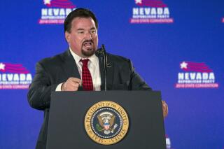 FILE - Nevada State GOP Chairman Michael McDonald announces President Donald Trump before he speaks the Nevada Republican Party Convention at the Suncoast Hotel and Casino Saturday, June 23, 2018, in Las Vegas. New transcripts released on Wednesday, Dec. 21, 2022, by the House Jan. 6 committee reveals Donald Trump and his allies played a direct role in the Nevada Republican Party's phony elector scheme in 2020. The transcripts show McDonald invoked his Fifth Amendment protection 275 times when he was interviewed in February. (AP Photo/L.E. Baskow, File)