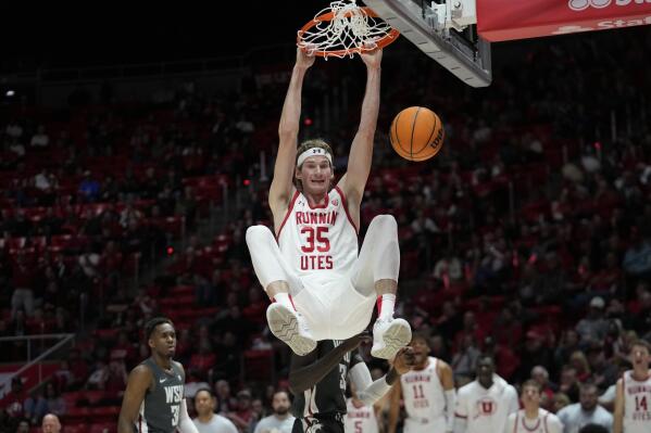 Utah center Branden Carlson (35) dunks against Washington State during the second half of an NCAA college basketball game Thursday, Jan. 19, 2023, in Salt Lake City. (AP Photo/Rick Bowmer)