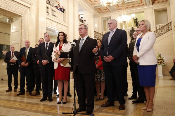 Jeffrey Donaldson, leader of the DUP, speaks to the media at Stormont Parliament Buildings in Belfast, Northern Ireland, Saturday, Feb. 3, 2024. Sinn Fein vice president Michelle O'Neill is set to become the first nationalist first minister following a two-year political collapse. Members of the Legislative Assembly (MLAs) will gather at Parliament Buildings at Stormont on Saturday for a sitting where ministers will be appointed to a powersharing executive, bringing an end to the impasse.(AP Photo/Peter Morrison)