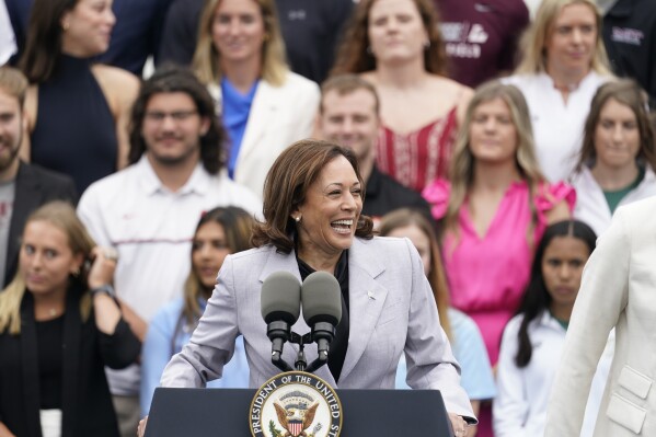 Vice President Kamala Harris speaks as the women's and men's NCAA Champion teams from the 2022-2023 season are celebrated during College Athlete Day on the South Lawn of the White House, Monday, June 12, 2023. (AP Photo/Andrew Harnik)