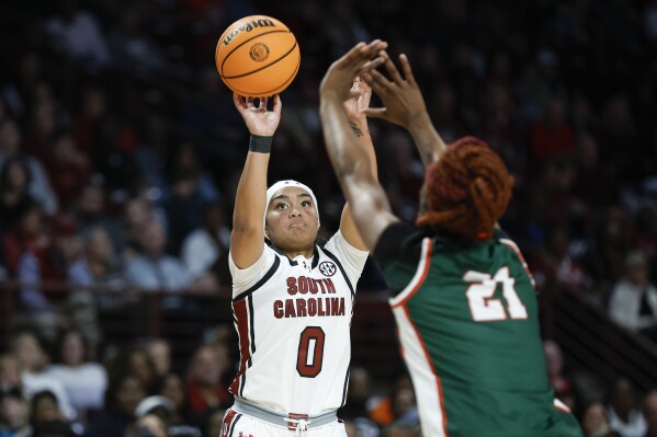 South Carolina guard Te-Hina Paopao (0) shoots over Mississippi Valley State forward Amberly Brown during the first half of an NCAA college basketball game in Columbia, S.C., Friday, Nov. 24, 2023. (AP Photo/Nell Redmond)