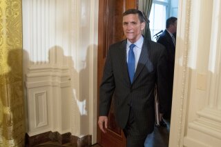 
              FILE - In this Jan. 22, 2017 file photo, National Security Adviser Michael Flynn arrives for a White House senior staff swearing in ceremony in the East Room of the White House, in Washington. President Donald Trump's former national security adviser has provided so much information to the special counsel's Russia investigation that prosecutors say he shouldn't do any prison time, according to a court filing Tuesday, Dec. 4, 2018, that describes Flynn's cooperation as "substantial." (AP Photo/Andrew Harnik, File)
            