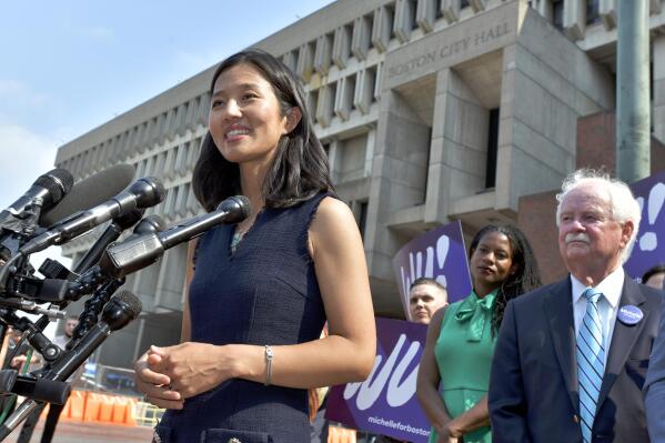Mayoral Candidate City Councilor Michelle Wu speaks to reporters outside City Hall in Boston on Wednesday, Sept. 15, 2021. Wu placed first in a preliminary mayoral election that selected two top contenders from a field of five candidates all of whom are people of color, four of them women. (AP Photo/Josh Reynolds)