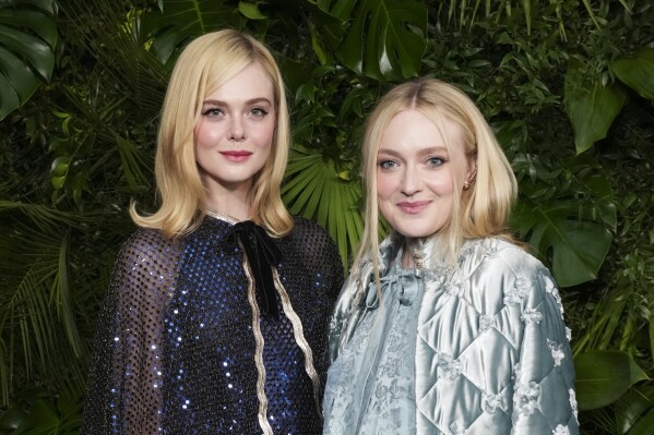 Elle Fanning, left, and Dakota Fanning arrive at Chanel's 16th Annual Pre-Oscar Awards Dinner on Saturday, March 1, 2025, at The Beverly Hills Hotel in Beverly Hills, Calif. (Photo by Jordan Strauss/Invision/AP)
