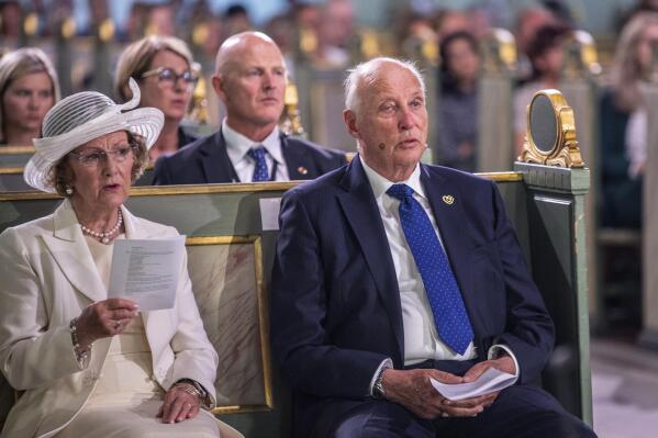 Norway's King Harald and Queen Sonja sing, during the memorial service at Oslo Cathedral, on the 10-year anniversary of the terrorist attack by Anders Breivik, in Oslo, Thursday, July 22, 2021. Commemorations were held marking the 10-year anniversary of Norway’s worst ever peacetime slaughter. On July 22, 2011, rightwing terrorist Anders Breivik set of a bomb in the capital, Oslo, killing eight people, before heading to tiny Utoya island where he stalked and shot dead 69 mostly teen members of the Labor Party youth wing. (Annika Byrde/NTB scanpix via AP)