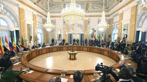 FILE - In this handout photo provided by Photo host Agency RIA Novosti, Russian President Vladimir Putin, at left, attends a meeting with a delegation of African leaders and senior officials in St. Petersburg, Russia, Saturday, June 17, 2023. By halting a landmark deal that allowed Ukrainian grain exports via the Black Sea, Putin has taken a risky gamble that could badly damage Moscow's relations with many of its partners that have remained neutral or even supportive of the Kremlin amid the war in Ukraine. Russia has also played spoiler at the United Nations, vetoing a resolution on extending humanitarian aid deliveries via a key crossing point in northwestern Syria and backing Mali's push to expel the U.N. peacekeepers. Putin's decision to spike the deal could backfire against Russia's own interests, straining Moscow's relations with key partner Turkey and hurting its ties with African countries. (Pavel Bednyakov/Photo host Agency RIA Novosti via AP, File)