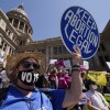 FILE - Abortion rights demonstrators attend a rally at the Texas state Capitol in Austin, Texas, May 14, 2022. A pregnant Texas woman whose fetus has a fatal diagnosis asked a court Tuesday, Dec. 5, 2023, to let her terminate the pregnancy, bringing what her attorneys say is the first lawsuit of its kind in the U.S. since Roe v. Wade was overturned last year.(AP Photo/Eric Gay, File)