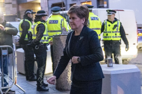 Former Scottish First Minister Nicola Sturgeon arrives for the UK Covid-19 Inquiry hearing at the Edinburgh International Conference Centre (EICC) in Edinburgh, Scotland, Wednesday, Jan. 31, 2024. The Scottish leader during the COVID-19 pandemic has admitted that she did delete WhatsApp messages but insisted that anything of relevance to how policymaking was conducted had been made available for the public record. (Jane Barlow/PA via AP)