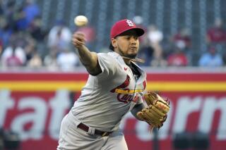 St. Louis Cardinals pitcher Carlos Martinez throws against the Arizona Diamondbacks in the first inning during a baseball game, Thursday, May 27, 2021, in Phoenix. (AP Photo/Rick Scuteri)