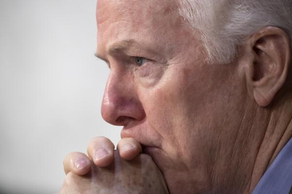 FILE - Sen. John Cornyn, R-Texas, listens to testimony during a Senate Intelligence Committee hearing on Capitol Hill in Washington, Wednesday, July 25, 2018. In the aftermath of the recent school shooting in Uvalde, Texas, his home state, Cornyn and a bipartisan group of senators including Sen. Chris Murphy, D-Conn., are holding private virtual meetings to try to strike a compromise over gun safety legislation. (AP Photo/J. Scott Applewhite, File)