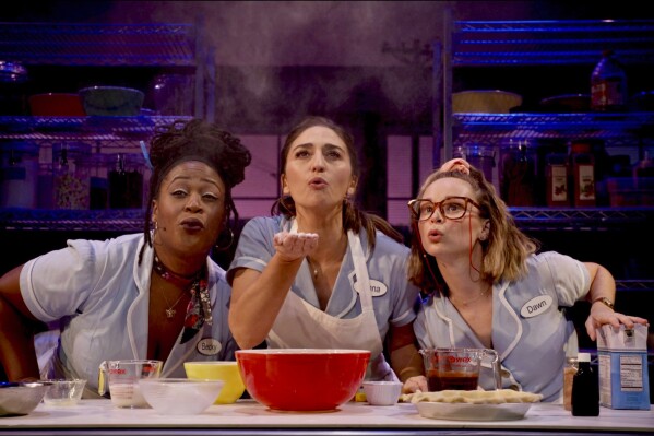 This image released by Bleecker Street shows Charity Angél Dawson, from left, Sara Bareilles, and Caitlin Houlahan in a scene from "Waitress: The Musical." (Bleecker Street via AP)
