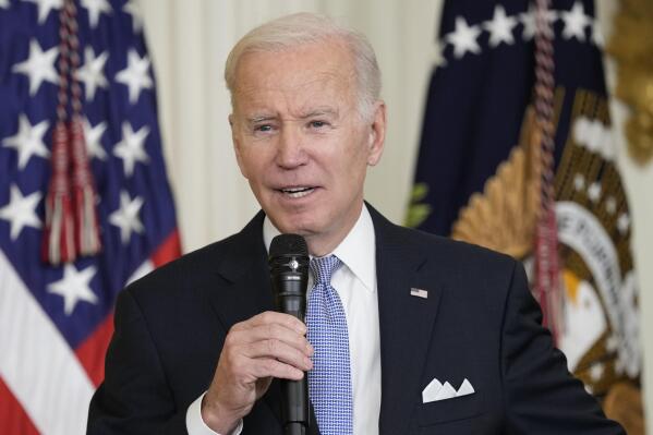 CORRECTS THAT THE FBI TOOK ITEMS THAT CONTAINED DOCUMENTS WITH CLASSIFIED MARKINGS INSTEAD OF SIX DOCUMENTS - FILE - President Joe Biden speaks in the East Room of the White House to mayors who are attending the U.S. Conference of Mayors winter meeting in Washington, on Friday, Jan. 20, 2023. The FBI searched Biden’s home in Wilmington, Del., on Friday and located additional items consisting of documents with classified markings and also took possession of some of his handwritten notes, the president’s lawyer said Saturday, Jan. 21. (AP Photo/Susan Walsh, File)