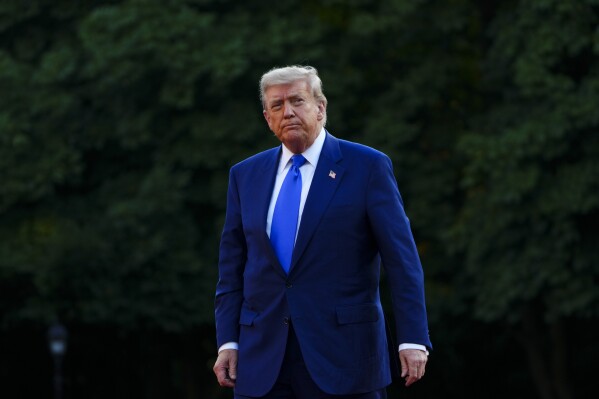 President Donald Trump arrives for a formal dinner at the Huis Ten Bosch Palace during the NATO Summit in The Hauge, Netherlands on Tuesday, June 24, 2025. (Sean Kilpatrick/The Canadian Press via AP)