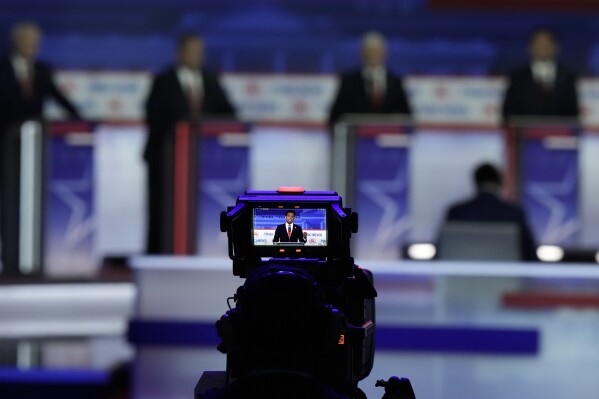 FILE - As seen on a video camera screen businessman Vivek Ramaswamy speaks during a Republican presidential primary debate hosted by FOX News Channel Wednesday, Aug. 23, 2023, in Milwaukee. The second Republican presidential debate starts at 9 p.m. ET on Wednesday, Sept. 27, at the Ronald Reagan Presidential Library in California. (AP Photo/Morry Gash, File)