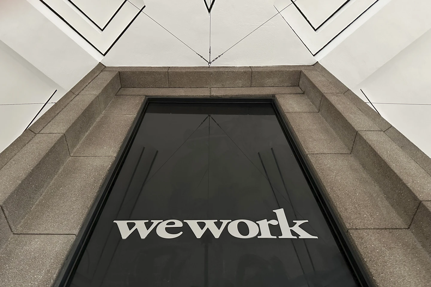 WeWork seeks bankruptcy protection in stunning fall for a company once valued close to $50 billion