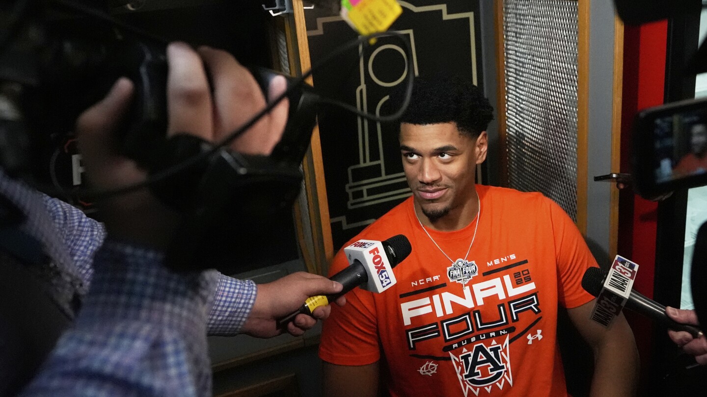 Auburn goes from early turbulence with players in the air to landing in the NCAA Final Four
