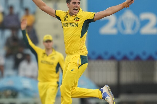 Australia's captain Pat Cummins unsuccessfully appeals for the wicket of Sri Lanka's Charith Asalanka during the ICC Men's Cricket World Cup match between Australia and Sri Lanka in Lucknow, India, Monday, Oct. 16, 2023. (AP Photo/Aijaz Rahi)