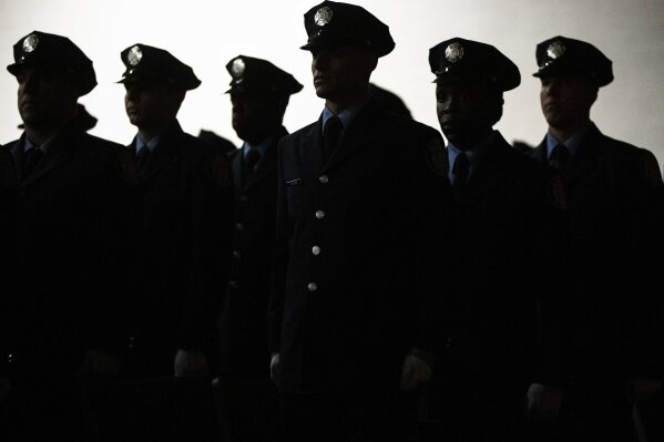 Philadelphia Fire Department cadets from Class 196 arrive for their graduation ceremony in Philadelphia, Wednesday, Nov. 13, 2019. These cadets will enable the department to start reopening companies that were closed during the recession. (AP Photo/Matt Rourke)