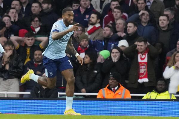 Brentford's Ivan Toney celebrates after scoring his side's first goal goal during the English Premier League soccer match between Arsenal and Brentford at Emirates stadium in London, Saturday, Feb. 11, 2023. (AP Photo/Frank Augstein)